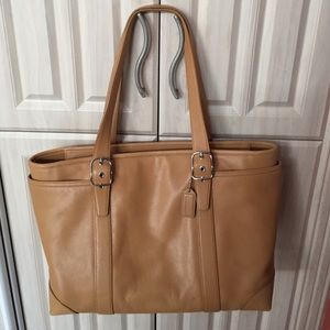 Classic leather coach bag.